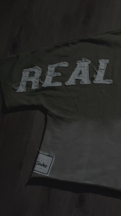 OLIVE GREEN “REAL MOTION” CROP TEE